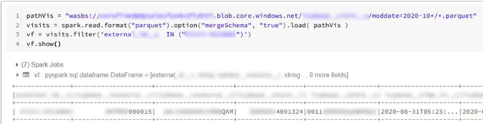 Example of a Databricks cell output in the Azure environment showing Spark Jobs execution with a filtered DataFrame and sample data preview.